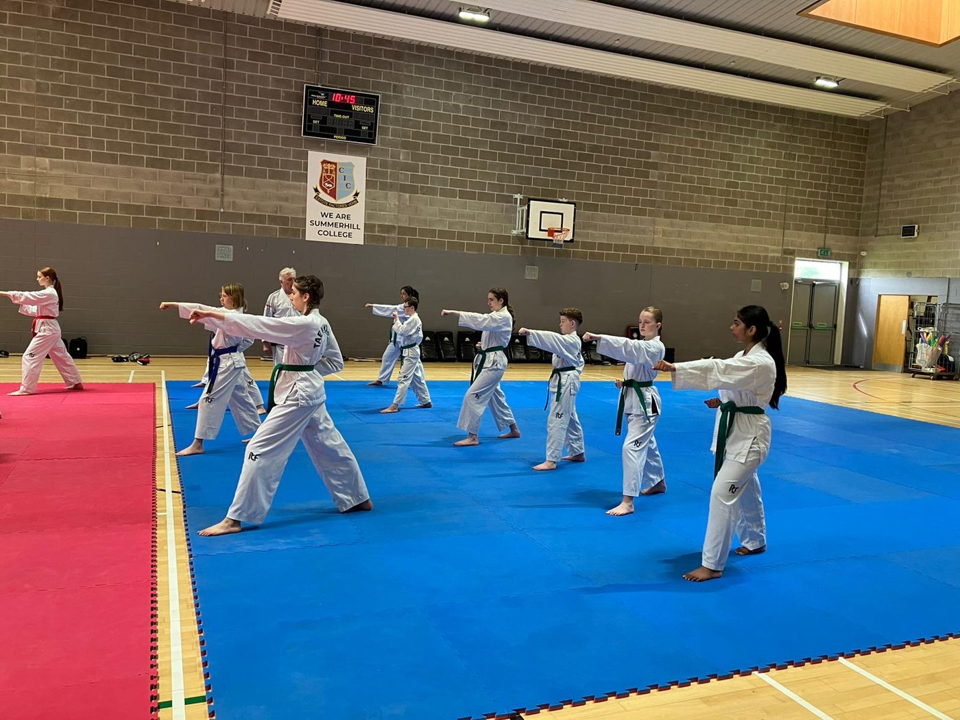 Teens and adults training side by side